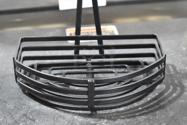 Black metal countertop holder, brand new with minor scratches and dents. Durable design, perfect for organizing spaces.