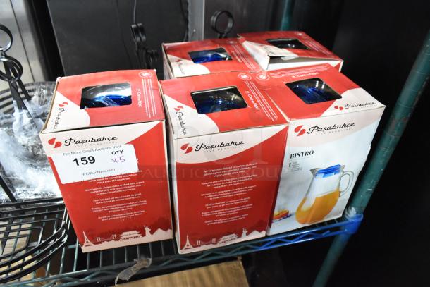 5 brand new Pasabahce Bistro from Steelite International 61 oz. glass pitchers in boxes. Scratch and dent items. Quantity label shows 5.