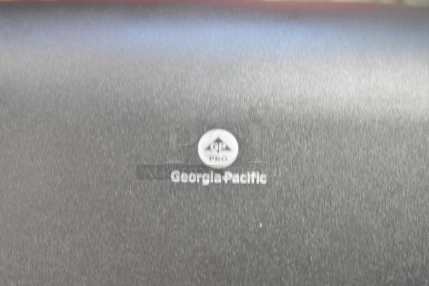 Brand new Georgia Pacific Poly Wall Mount Pacific Blue Towel Dispenser, scratch and dent condition, logo visible.