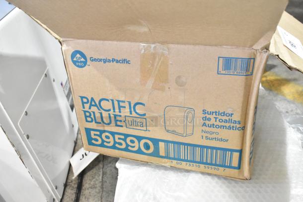 Brand new Georgia Pacific Pacific Blue Ultra Wall Mount Towel Dispenser, slight box damage, model 59590.