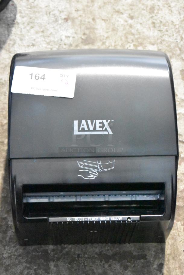 Lavex black poly wall mount paper towel dispenser, new with minor scratches. Features "No Touch" sensor operation.