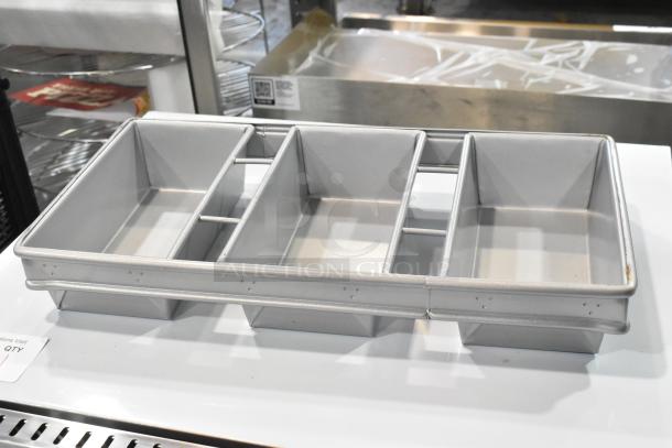 2 brand new Bakers Mark metal 3-loaf baking pans, scratch and dent condition, durable build, perfect for baking multiple loaves.
