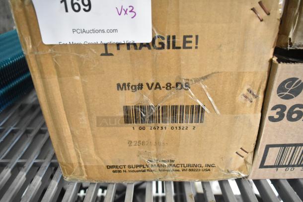 Cardboard box labeled "Fragile" with barcode. Contains three new items: GET E0583 plates, Corona ramekin, Libbey glass.