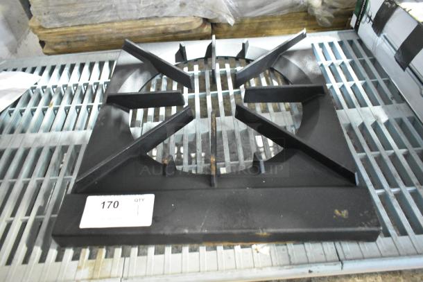 Brand new single burner range grate, scratched and dented; features sturdy cast iron design. Label shows quantity 1, item 170.
