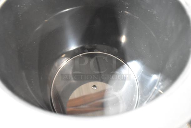 Brand new Carlisle CM101203 Black 3 Gallon Coldmaster Ice Cream Cold Crock with lid, minor scratches, includes extra bin.