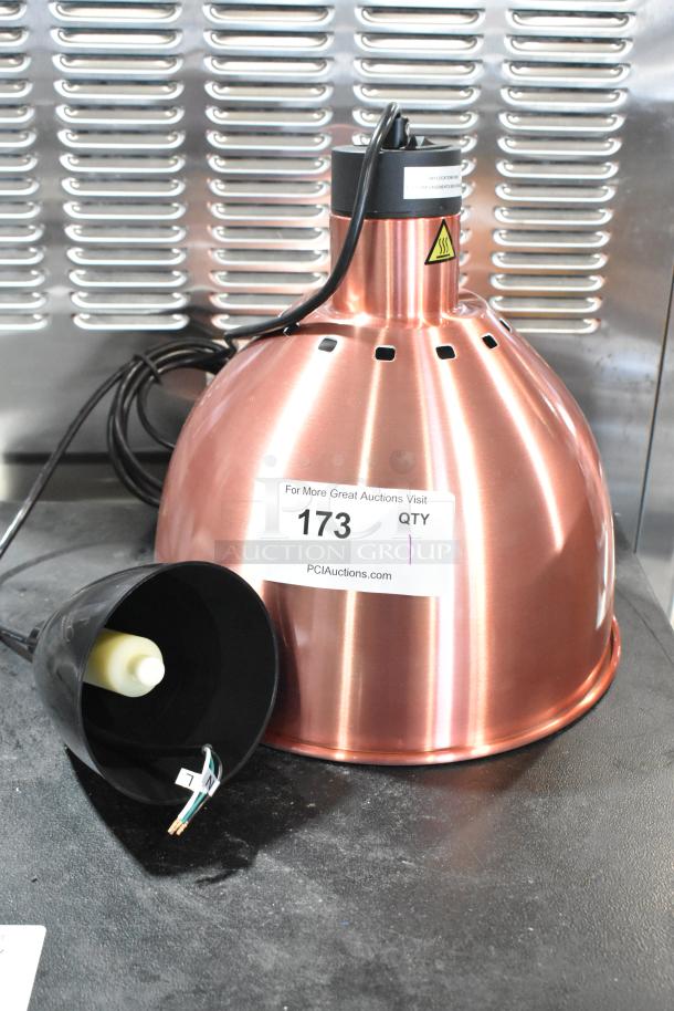 Brand new ServIt 423HLS85CR 8' heat lamp, copper finish, round dome shade, ceiling mount, 120V, 1 phase. Auction label visible.