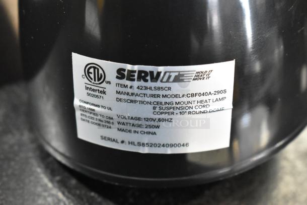 Ceiling mount heat lamp by ServIt, model 423HLS85CR, copper finish, 8' cord, 120V, 250W, label visible with specs.