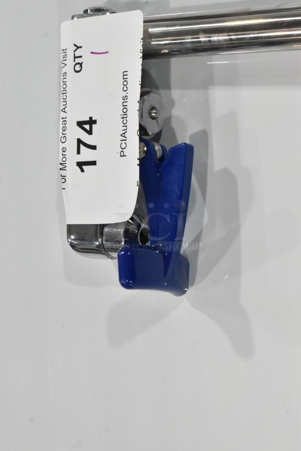 Brand new metal water faucet, scratch and dent condition, chrome finish with blue handle, auction tag QTY 174 visible.