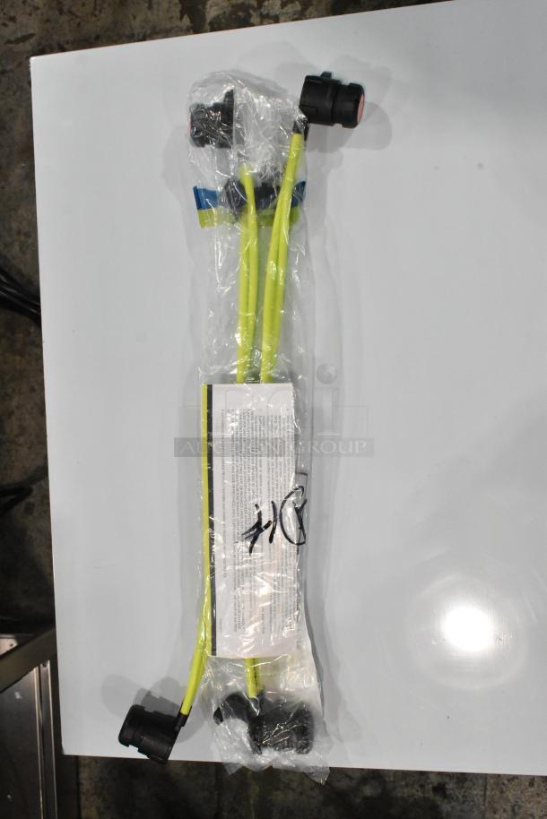 BRAND NEW Flat KT22 Actuator Device, sealed, yellow cables, minor scratches, factory markings visible.