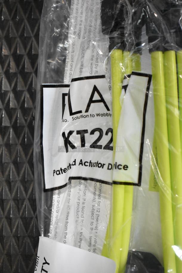 Brand new KT22 actuator device in packaging, labeled as "Patented Actuator Dice", with minor scratches and dents visible.