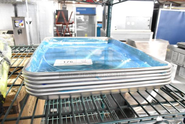 6 new 13"x18" Choice half-size aluminum bun pans, 19 gauge, wire rim, minor cosmetic scratches. SKU 407BUNHALF.