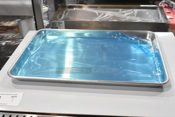 6 brand new 13" x 18" aluminum bun pans, 19 gauge. Wire rim. Scratch and dent condition. Blue protective film.