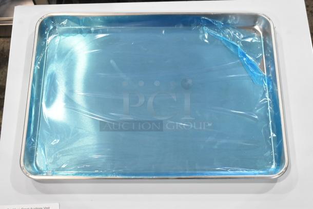 6 new Choice 407BUNHALF half-size aluminum sheet pans, 13" x 18", 19 gauge, in plastic wrap, scratch and dent condition.