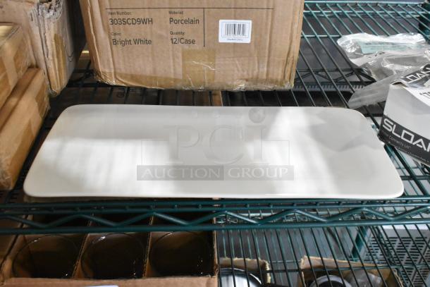 Acopa Lore 9 1/4" Bright White Porcelain Plate, new condition, item number 303SCD9WH, on a shelf with packaging visible.