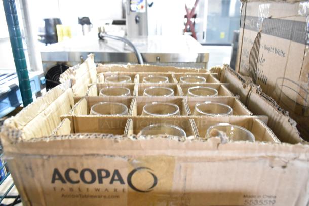 Box of Acopa 12 oz. customizable stemless wine glasses, brand new, scratch and dent condition, with visible labeling.