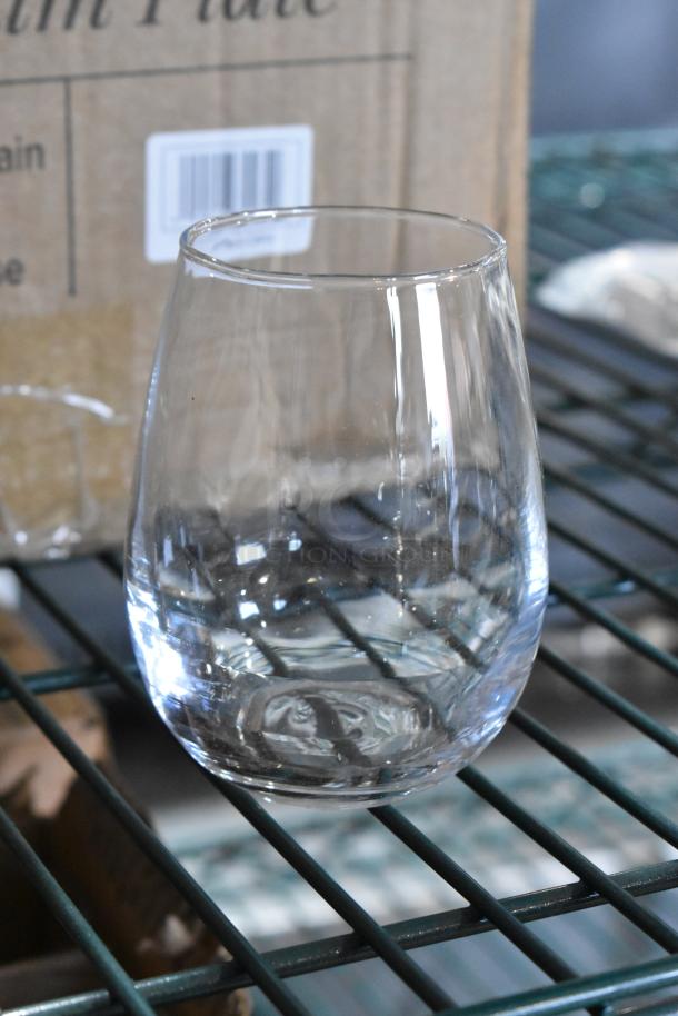 Acopa 12 oz. customizable stemless wine glass, new with minor scratches, clear glass, ideal for branding.