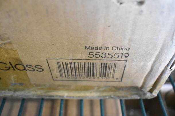 Cardboard box labeled with "Made in China" and barcode 5535519, contains Acopa items. Box shows signs of wear.