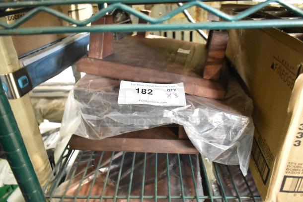 3 Valor rubberwood display stands, 16"x11 7/8"x4 1/8", rustic chestnut finish, new with scratches/dents, lot of 3.