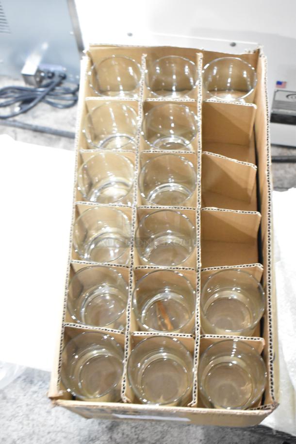 Box of Libbey 918CD heavy base 13.5 oz. rocks glasses, new scratch and dent condition, in cardboard dividers.