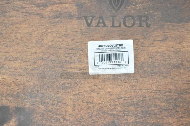 Valor rubberwood display stand, 16"x11 7/8"x4 1/8", rustic chestnut finish, label #825ULOVLSTND; new condition.