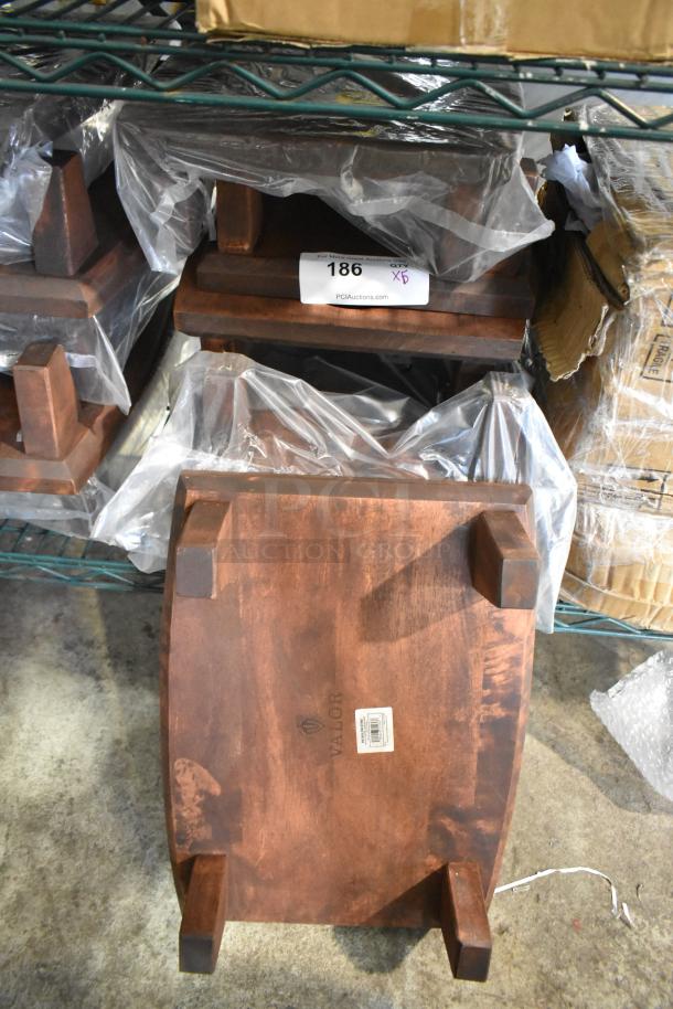 5 Valor rubberwood display stands, dimensions 16"x11 7/8"x4 1/8", rustic chestnut finish, new scratch and dent condition.