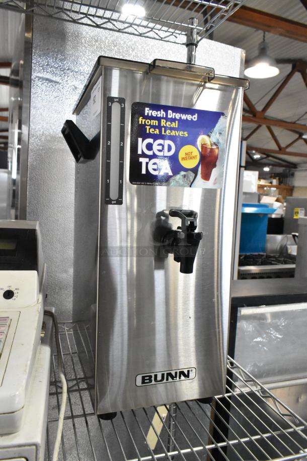 Bunn TD4T Stainless Steel Beverage Dispenser featuring an iced tea label, marked to hold up to 3 gallons.