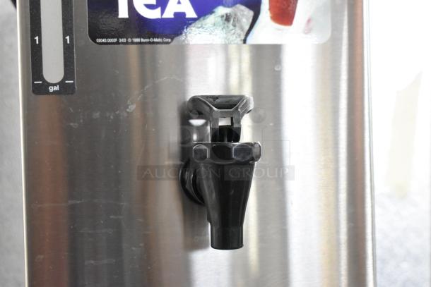 Bunn TD4T stainless steel beverage holder with black tap, 1-gallon capacity indicator, and bold "Iced Tea" label.