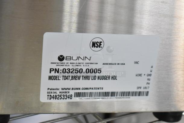 Bunn TD4T stainless steel beverage holder dispenser with label showing model, part number, and serial number.