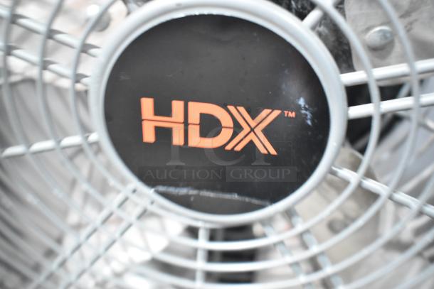 HDX SFSD1-500B3W metal floor fan, 120V, 1 phase, featuring a protective grill and HDX logo.