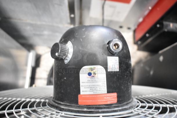 HDX SFSD1-500B3W metal floor fan, 120 volts, black, with control dial and label detailing specifications.