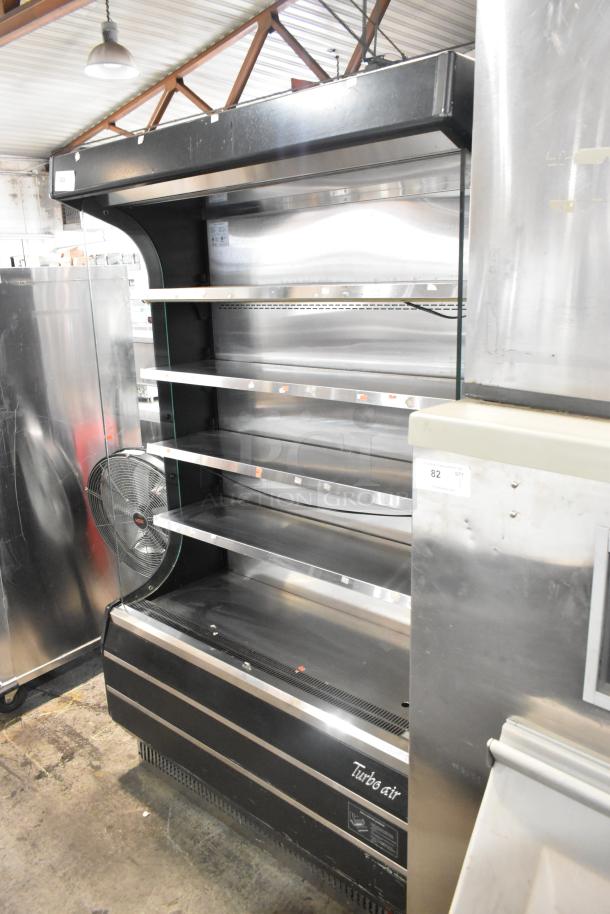 Turbo Air TOM-50B commercial open merchandiser with metal shelves, black finish, 120V, 1 phase, in good condition.