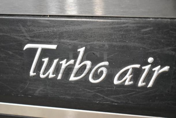 Turbo Air TOM-50B commercial grab n go merchandiser with metal shelves, shown with Turbo Air logo. 120 Volts, 1 Phase.