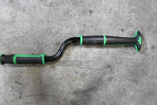 Unger Walking Stick with ergonomic black and green design, textured grip handle, and curved shaft; excellent condition.