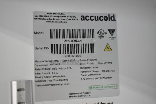 Accucold AFG26MLLH tag showing model, serial number, 115V, R-290 refrigerant, free-standing installation, made in Guatemala.