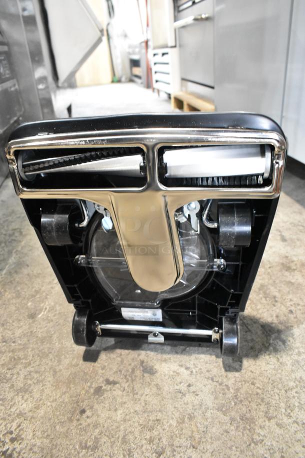 Lavex P101 Vacuum Cleaner base view, 120 Volts, 1 Phase, metal brush cover, visible wheels, good condition.