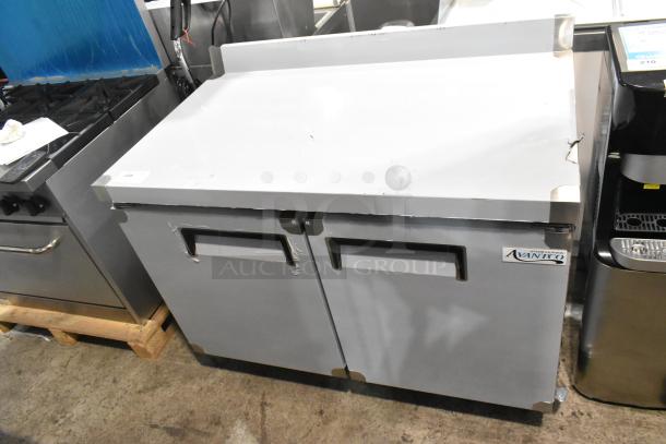 Avantco 178AU48R stainless steel 2-door work top cooler, scratch and dent, on commercial casters, 115V, 1 phase.