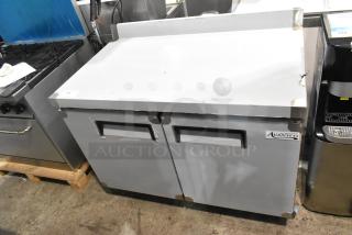 Avantco 178AU48R stainless steel 2-door work top cooler, scratch and dent, on commercial casters, 115V, 1 phase.