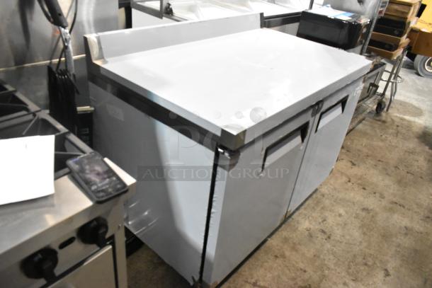 Brand new Avantco 178AU48R stainless steel 2-door work top cooler on commercial casters. Scratch and dent condition. 115V, 1 Phase.