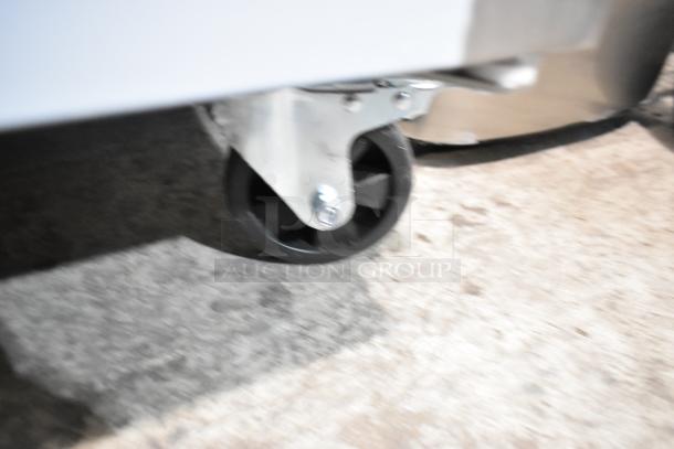 Avantco 178AU48R stainless steel cooler on commercial caster, showing the wheel detail. Brand new, scratch and dent condition.