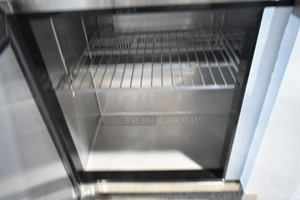 Brand new Avantco 178AU48R stainless steel 2-door work top cooler, commercial casters, 115V, scratch and dent condition.
