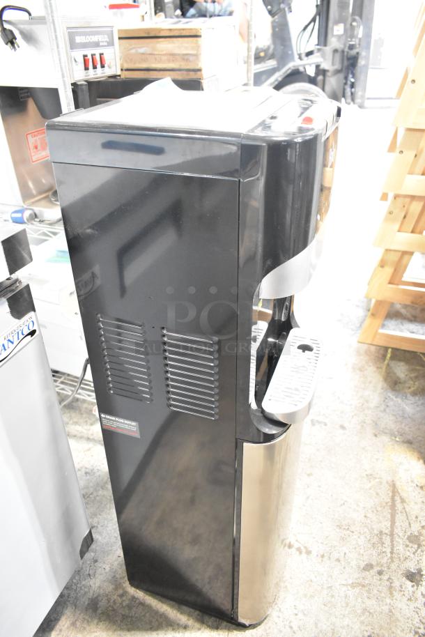 Brio CLBL420V2 water dispenser, black, 115 volts, 1 phase, side view. Good condition with vent details visible.