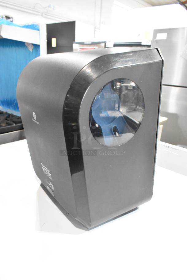 Georgia Pacific black poly wall mount paper towel dispenser, modern design, visible logo, excellent condition.