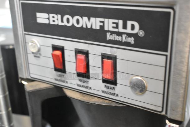 Bloomfield 8571 stainless steel coffee machine, 3 burners, poly brew basket, 120V, 1 phase, red warmer switches shown.