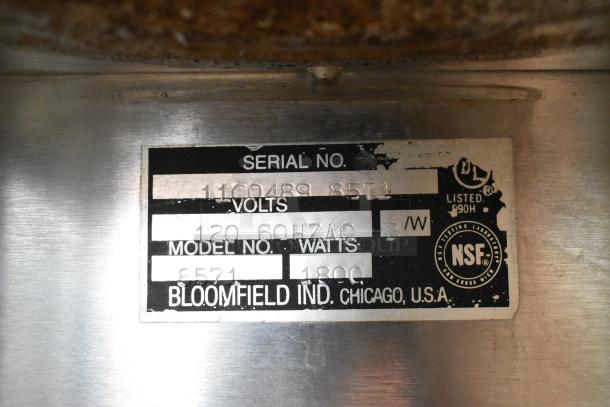 Bloomfield 8571 coffee machine label showing 120 volts, model number, watts, and NSF certification.