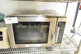 2016 Menumaster RFS12TSW stainless steel commercial microwave oven, 120 volts, visible keypad, used condition, auction tag attached.