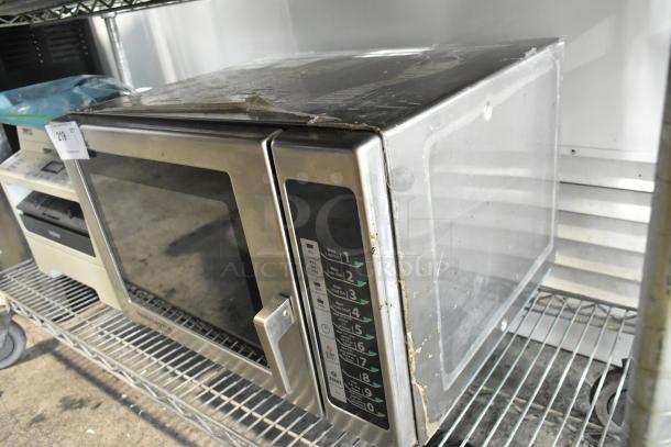2016 Menumaster RFS12TSW stainless steel commercial countertop microwave oven, visible buttons, used condition, 120 volts.