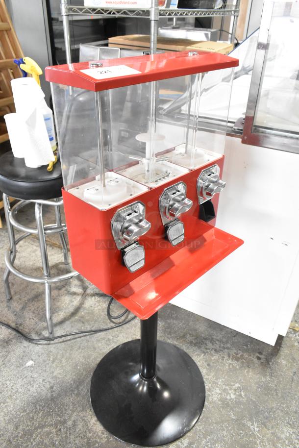 Metal 3 Compartment Vending Machine, red and silver, in good condition, with three coin-operated mechanisms, label indicating lot number 221.