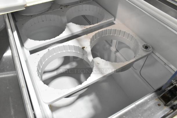 2016 True TDC-87 commercial ice cream dipping cabinet, metal construction, interior view with adjustable container holders, 115V, 1 phase.