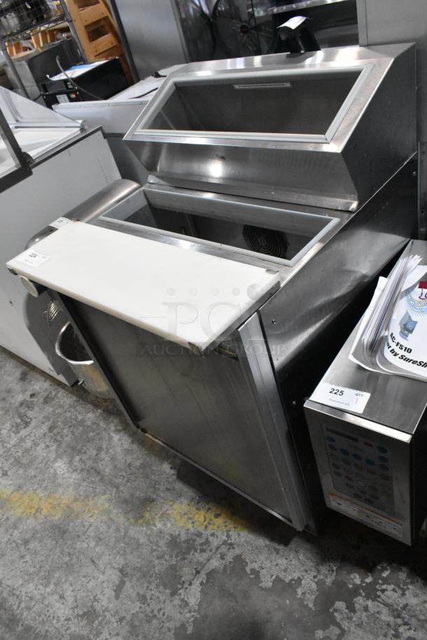 Silver King SKF2A stainless steel commercial prep table, 115V, 1 phase, used, with integrated cutting board and cooling compartment.