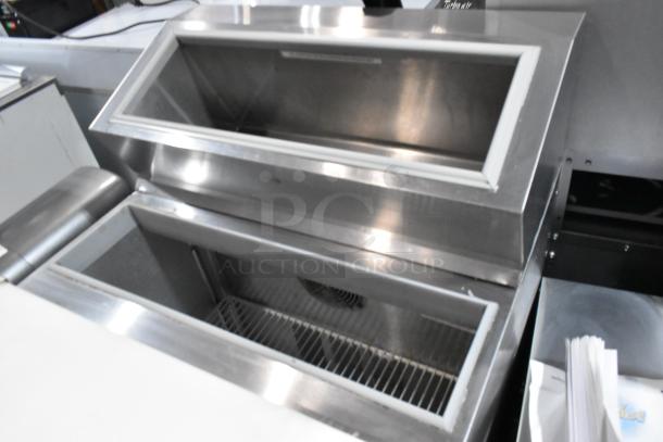 Silver King SKF2A stainless steel commercial prep table, 115V, 1 phase. Open top view showing interior compartment and wire shelf.